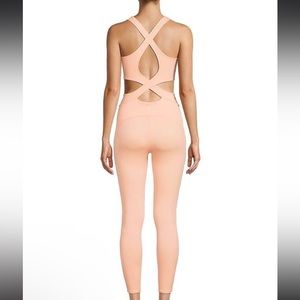 NWOT Free People Back It Up Onesie sz small